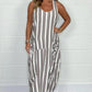 Gestreiftes Oversize-Kleid mit Bindegürtel und Tasche vorne