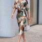 Elegantes Wickelkleid aus Satin mit abstraktem Print für Damen