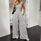 Jumpsuit mit Spaghettiträgern, weitem Bein und Taschen