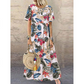Maxikleid mit Retro-Blumenmuster 🌼 Rundhalsausschnitt, kurze Ärmel, locker und fließend – damit siehst du aus, als wärst du direkt aus einem Garten entsprungen 🌿