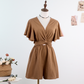 Eleganter Overall mit Ausschnitt an der Taille